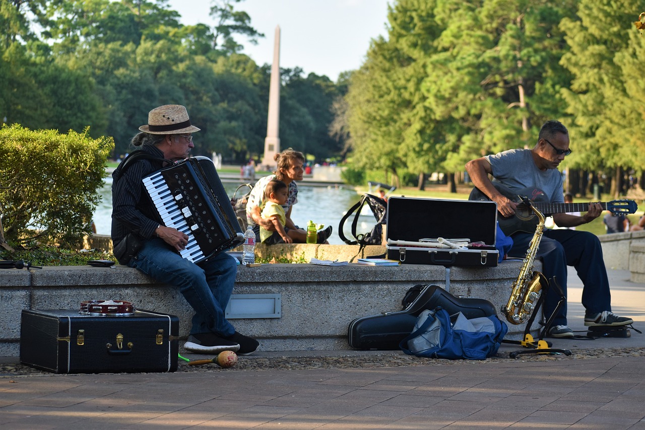Street musicians performing along Buffalo Bayou in Houston